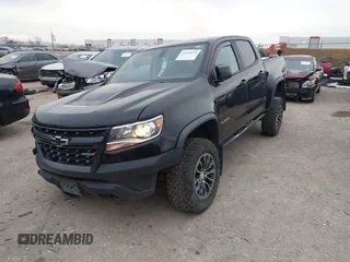 2018 Chevrolet Colorado 4WD ZR2 with VIN 1GCGTEENXJ1164617, listed as a IAAI auction lot 41354074 with 61,155 mi miles. Bid and sale history available at carsss.com. Image 2.