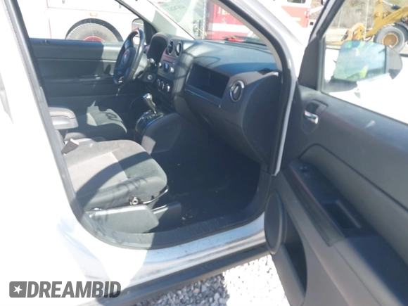 2011 Jeep Compass with VIN 1J4NF1FB7BD197404, listed as a IAAI auction lot 41876261 with 150,891 mi miles and . Bid and sale history available at DreamBid. Image 5.