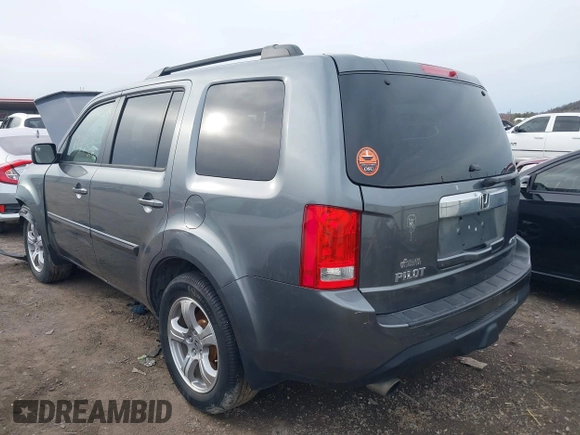 2013 Honda Pilot EX-L with VIN 5FNYF4H74DB041569, listed as a IAAI auction lot 41728937 with 223,355 mi miles and . Bid and sale history available at DreamBid. Image 3.