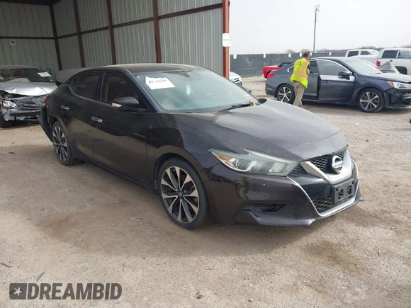 2016 Nissan Maxima SL z VIN 1N4AA6AP1GC379279, wystawiony jako IAAI lot #41738089 z przebiegiem 113 677 mil mil oraz . Historia ofert i sprzedaży dostępna na DreamBid. Obrazek 1.