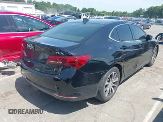 2015 Acura TLX with VIN 19UUB1F34FA006990, listed as a IAAI auction lot 42546445 with 74,227 mi miles and . Bid and sale history available at DreamBid. Image 4.