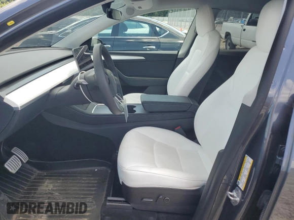 2022 Tesla Model Y Performance with VIN 7SAYGDEF3NF532311, listed as a Copart auction lot 62997535 with 60,530 mi miles and Salvage title. Bid and sale history available at DreamBid. Image 7.
