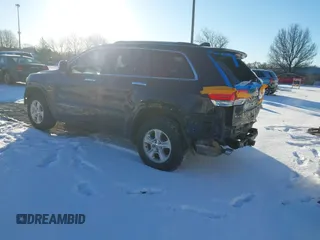 2014 Jeep Grand Cherokee Overland with VIN 1C4RJFCG1EC200570, listed as a IAAI auction lot 41301398 with 183,986 mi miles. Bid and sale history available at carsss.com. Image 3.