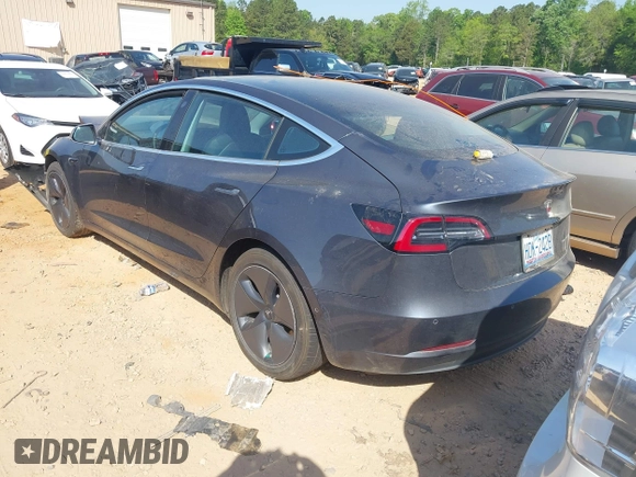 2019 Tesla Model 3 Long Range with VIN 5YJ3E1EB2KF510398, listed as a IAAI auction lot 42067654 with 108,971 mi miles and . Bid and sale history available at DreamBid. Image 3.