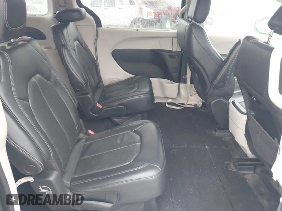 2022 Chrysler Pacifica Touring L with VIN 2C4RC1BG9NR142830, listed as a IAAI auction lot 42412136 with 104,964 mi miles and . Bid and sale history available at DreamBid. Image 8.
