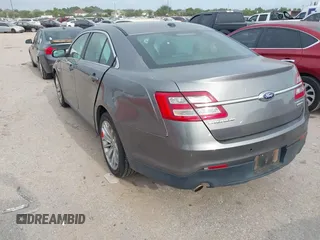 2014 Ford Taurus Limited with VIN 1FAHP2F81EG123902, listed as a IAAI auction lot 42345275 with 152,673 mi miles and . Bid and sale history available at DreamBid. Image 3.