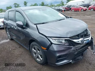 2018 Honda Odyssey EX-L z VIN 5FNRL6H74JB043276, wystawiony jako IAAI lot #42326742 z przebiegiem 126 025 mil mil oraz . Historia ofert i sprzedaży dostępna na DreamBid. Obrazek 1.