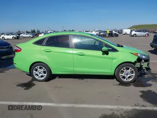 2015 Ford Fiesta SE with VIN 3FADP4BJ7FM211041, listed as a IAAI auction lot 41625903 with 135,532 mi miles. Bid and sale history available at carsss.com. Image 14.