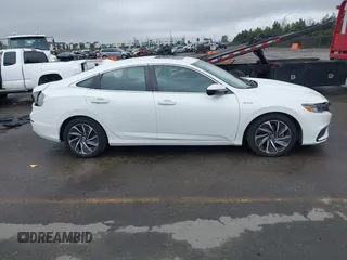 2021 Honda Insight Touring with VIN 19XZE4F96ME000099, listed as a IAAI auction lot 41533789 with 83,490 mi miles and . Bid and sale history available at carsss.com. Image 14.