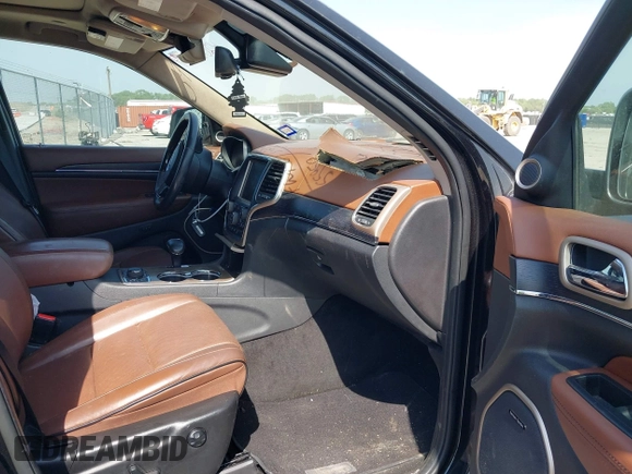 2015 Jeep Grand Cherokee Summit with VIN 1C4RJFJM1FC867861, listed as a IAAI auction lot 42034207 with 92,205 mi miles and . Bid and sale history available at DreamBid. Image 5.