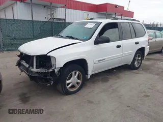 2005 GMC Envoy SLT with VIN 1GKDT13S952190876, listed as a IAAI auction lot 41308686 with 244,774 mi miles. Bid and sale history available at carsss.com. Image 2.