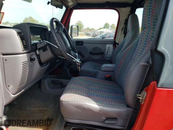 1997 Jeep Wrangler Sport with VIN 1J4FY19S2VP477079, listed as a Copart auction lot 54831895 with 254,358 mi miles and Clean Title. Bid and sale history available at carsss.com. Image 7.