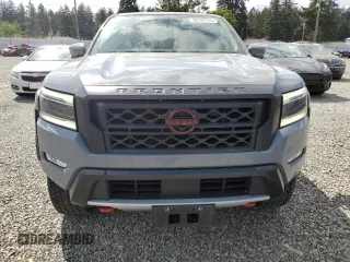 2023 Nissan Frontier SV with VIN 1N6ED1EKXPN610735, listed as a Copart auction lot 56197375 with 55,005 mi miles and Salvage title. Bid and sale history available at DreamBid. Image 5.