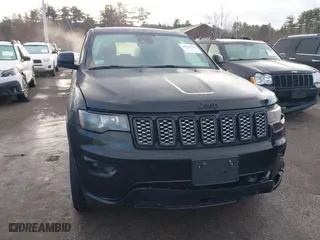 2021 Jeep Grand Cherokee Laredo X with VIN 1C4RJFAG6MC599672, listed as a IAAI auction lot 41323741 with 71,491 mi miles. Bid and sale history available at carsss.com. Image 12.