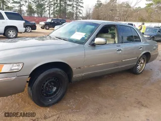 1998 Mercury Grand Marquis LS with VIN 2MEFM75W8WX687967, listed as a IAAI auction lot 41626058 with 135,183 mi miles. Bid and sale history available at carsss.com. Image 6.