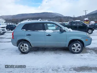 2006 Hyundai Tucson GL with VIN KM8JM72B06U298904, listed as a IAAI auction lot 41370728 with 209,284 mi miles. Bid and sale history available at carsss.com. Image 13.