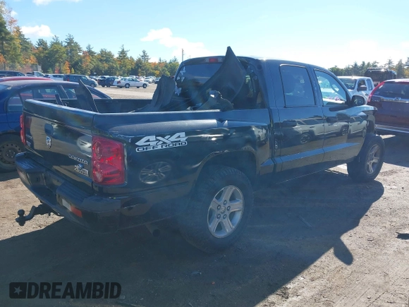 2011 Ram Dakota Bighorn/Lonestar with VIN 1D7RW3GK1BS606466, listed as a IAAI auction lot 40529380 with 110,431 mi miles. Bid and sale history available at carsss.com. Image 4.