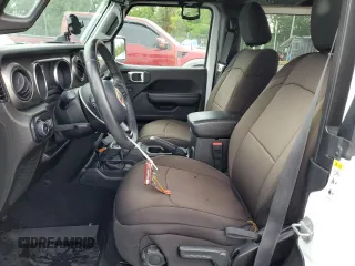 2019 Jeep Wrangler Sport S with VIN 1C4GJXAG0KW608696, listed as a Copart auction lot 57963455 with 51,955 mi miles and Salvage title. Bid and sale history available at DreamBid. Image 7.