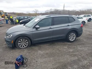 2019 Volkswagen Tiguan S with VIN 3VV0B7AX1KM046808, listed as a IAAI auction lot 41911225 with 62,972 mi miles and . Bid and sale history available at DreamBid. Image 14.