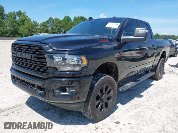 2023 Ram 2500 Big Horn with VIN 3C6UR5DL6PG504090, listed as a IAAI auction lot 42512380 with 50,231 mi miles and . Bid and sale history available at DreamBid. Image 2.