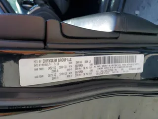 2014 Jeep Grand Cherokee Laredo with VIN 1C4RJFAG9EC527088, listed as a Copart auction lot 52164505 with 147,092 mi miles and Clean Title. Bid and sale history available at carsss.com. Image 14.