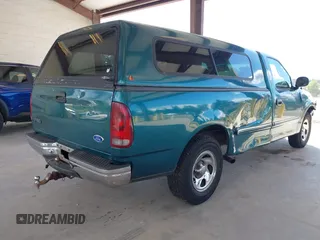 1997 Ford F-150 with VIN 1FTDF1727VKC49064, listed as a IAAI auction lot 42256020 with 197,494 mi miles and . Bid and sale history available at DreamBid. Image 4.