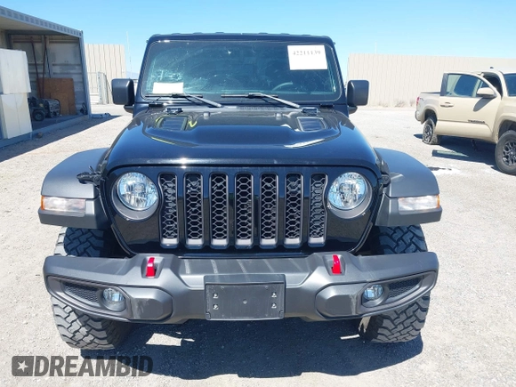 2023 Jeep Gladiator Rubicon z VIN 1C6JJTBG3PL531982, wystawiony jako IAAI lot #42211139 z przebiegiem 28 301 mil mil oraz . Historia ofert i sprzedaży dostępna na DreamBid. Obrazek 12.