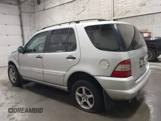 2000 Mercedes-Benz M 320/430/500 with VIN 4JGAB54E4YA199556, listed as a IAAI auction lot 42111380 with 155,061 mi miles and . Bid and sale history available at carsss.com. Image 14.