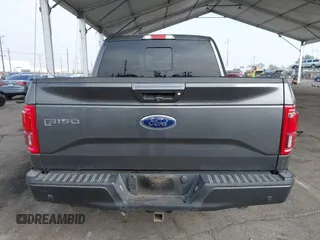 2016 Ford F-150 XLT with VIN 1FTEW1EG8GKE16490, listed as a IAAI auction lot 40622454 with 156,573 mi miles. Bid and sale history available at carsss.com. Image 16.