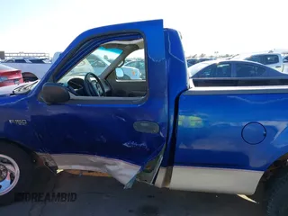 1997 Ford F-150 with VIN 1FTDF1722VKB97679, listed as a IAAI auction lot 41883923 with 211,640 mi miles and . Bid and sale history available at DreamBid. Image 14.