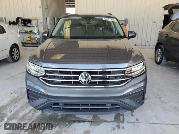 2024 Volkswagen Tiguan S with VIN 3VVRB7AX1RM085254, listed as a Copart auction lot 58622295 with 7,316 mi miles and Salvage title. Bid and sale history available at DreamBid. Image 5.