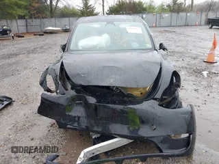 2023 Tesla Model Y Performance z VIN 7SAYGDEF0PF715703, wystawiony jako IAAI lot #41869780 z przebiegiem 32 220 mil mil oraz . Historia ofert i sprzedaży dostępna na DreamBid. Obrazek 11.