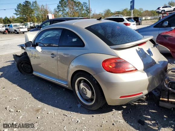 2012 Volkswagen Beetle 2.5L w/Sun/Sound/Nav PZEV with VIN 3VWHP7AT4CM659410, listed as a Copart auction lot 80688104 with 0 mi miles and Salvage Title. Bid and sale history available at carsss.com. Image 2.