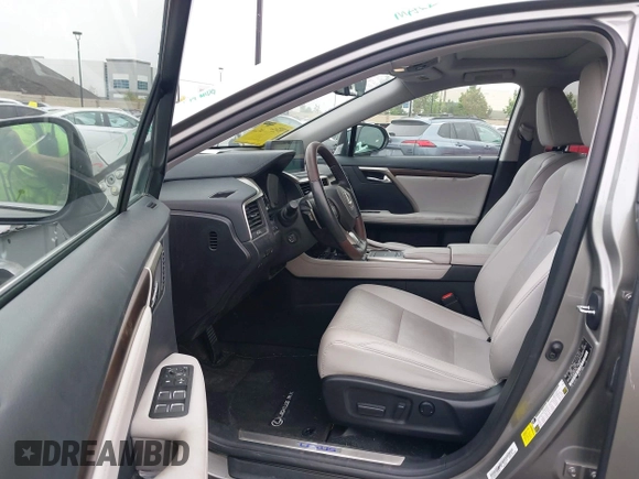 2022 Lexus RX 450h with VIN 2T2HGMDA7NC072735, listed as a IAAI auction lot 42356852 with 62,835 mi miles and . Bid and sale history available at DreamBid. Image 5.