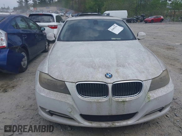 2011 BMW 3 Series 335i with VIN WBAPM5C51BE575704, listed as a IAAI auction lot 42005354 with 205,263 mi miles. Bid and sale history available at carsss.com. Image 11.