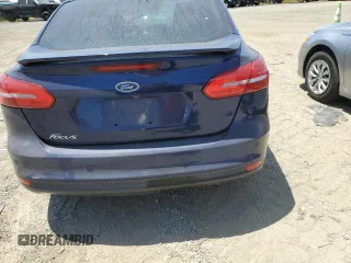 2016 Ford Focus Titanium z VIN 1FADP3J2XGL319399, wystawiony jako Copart lot #59258745 z przebiegiem 215 296 mil mil oraz Szkoda całkowita • Salvage title. Historia ofert i sprzedaży dostępna na DreamBid. Obrazek 6.