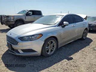 2018 Ford Fusion SE z VIN 3FA6P0LU1JR269023, wystawiony jako Copart lot #56929035 z przebiegiem 179 149 mil mil oraz Czysty tytuł • Clean title. Historia ofert i sprzedaży dostępna na DreamBid. Obrazek 1.