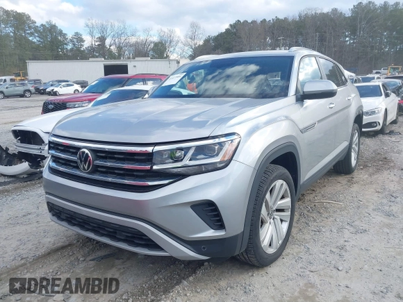 2021 Volkswagen Atlas SE with VIN 1V2JE2CA9MC224456, listed as a IAAI auction lot 41427604 with 24,803 mi miles and . Bid and sale history available at DreamBid. Image 2.