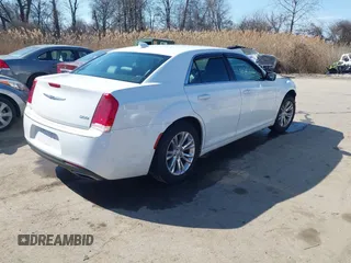 2017 Chrysler 300 Limited with VIN 2C3CCAAG1HH512125, listed as a IAAI auction lot 41677409 with 203,352 mi miles. Bid and sale history available at carsss.com. Image 4.