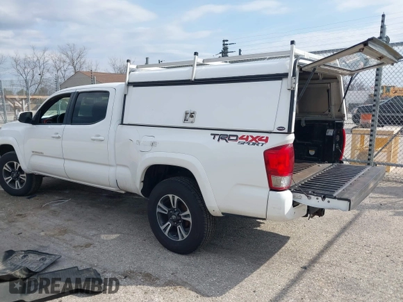 2017 Toyota Tacoma SR5 with VIN 3TMDZ5BN4HM018877, listed as a IAAI auction lot 41898666 with 198,848 mi miles. Bid and sale history available at carsss.com. Image 3.