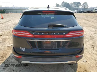 2019 Lincoln MKC Reserve with VIN 5LMCJ3D99KUL02590, listed as a Copart auction lot 48011365 with 100,976 mi miles and Salvage title. Bid and sale history available at DreamBid. Image 6.