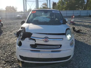 2014 FIAT 500L Easy z VIN ZFBCFABH4EZ023856, wystawiony jako Copart lot #76285024 z przebiegiem 131 343 mil mil oraz Szkoda całkowita • Salvage title. Historia ofert i sprzedaży dostępna na DreamBid. Obrazek 5.