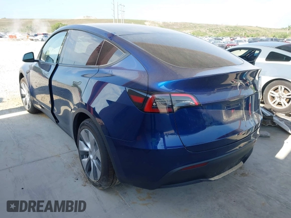 2022 Tesla Model Y Long Range z VIN 7SAYGAEE2NF364733, wystawiony jako IAAI lot #42290231 z przebiegiem 33 907 mil mil oraz . Historia ofert i sprzedaży dostępna na DreamBid. Obrazek 3.