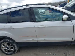 2013 Ford Escape SEL with VIN 1FMCU9H90DUD30837, listed as a IAAI auction lot 41922615 with 171,535 mi miles. Bid and sale history available at carsss.com. Image 14.