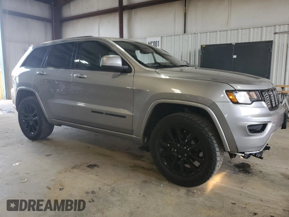 2017 Jeep Grand Cherokee Altitude with VIN 1C4RJFAG9HC772705, listed as a Copart auction lot 61562925 with 184,004 mi miles and Salvage title. Bid and sale history available at DreamBid. Image 4.