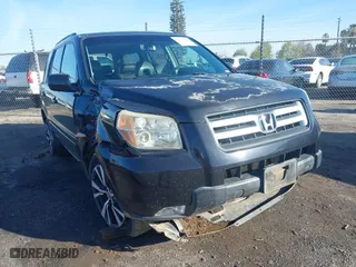 2006 Honda Pilot EX-L with VIN 5FNYF28586B037160, listed as a IAAI auction lot 41798991 with 207,486 mi miles. Bid and sale history available at carsss.com. Image 1.