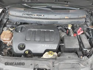 2013 Dodge Journey SXT with VIN 3C4PDDBG0DT660956, listed as a IAAI auction lot 41593385 with 196,021 mi miles and . Bid and sale history available at DreamBid. Image 10.