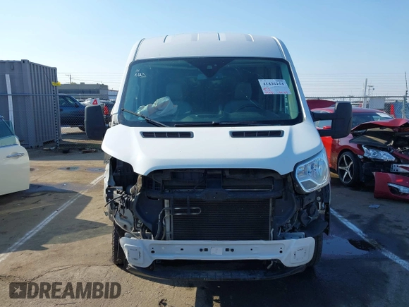 2019 Ford Transit z VIN 1FTYE2CMXKKA07267, wystawiony jako IAAI lot #41436154 z przebiegiem 127 422 mil mil oraz . Historia ofert i sprzedaży dostępna na DreamBid. Obrazek 13.
