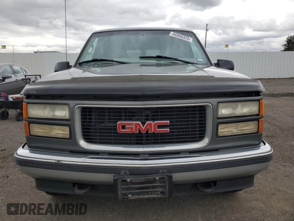 1999 GMC Suburban z VIN 1GKFK16R0XJ772880, wystawiony jako Copart lot #46986325 z przebiegiem 237 921 mil mil oraz Czysty tytuł • Clean title. Historia ofert i sprzedaży dostępna na DreamBid. Obrazek 5.