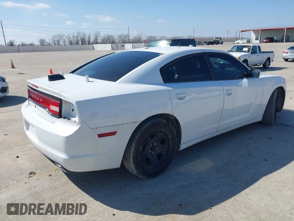 2012 Dodge Charger Police with VIN 2C3CDXAT6CH305817, listed as a IAAI auction lot 41608673 with 173,761 mi miles. Bid and sale history available at carsss.com. Image 4.